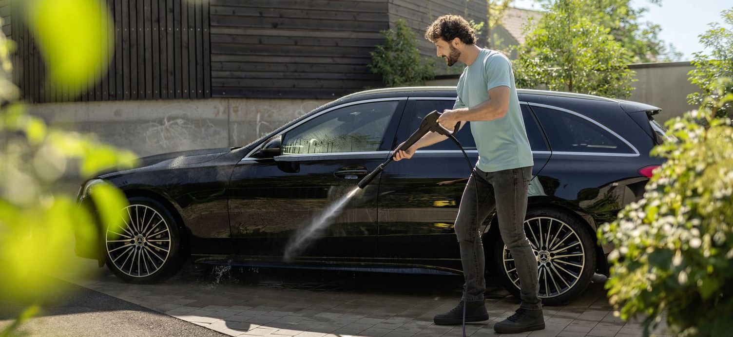 Cleaning the car with the pressure washer Cleaning the car with the pressure washer
