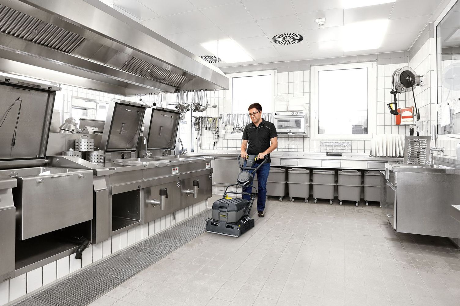 Cleaning fine stone with Kärcher scrubber driers