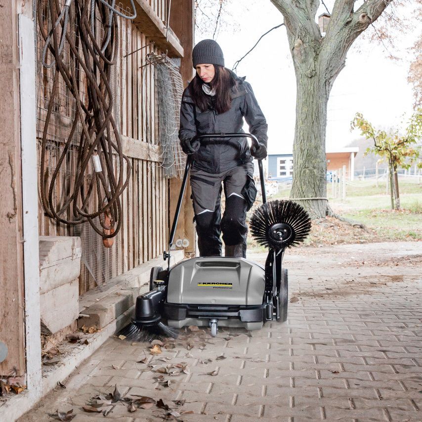 Cleaning with a sweeping machine Cleaning with a Kärcher sweeping machine