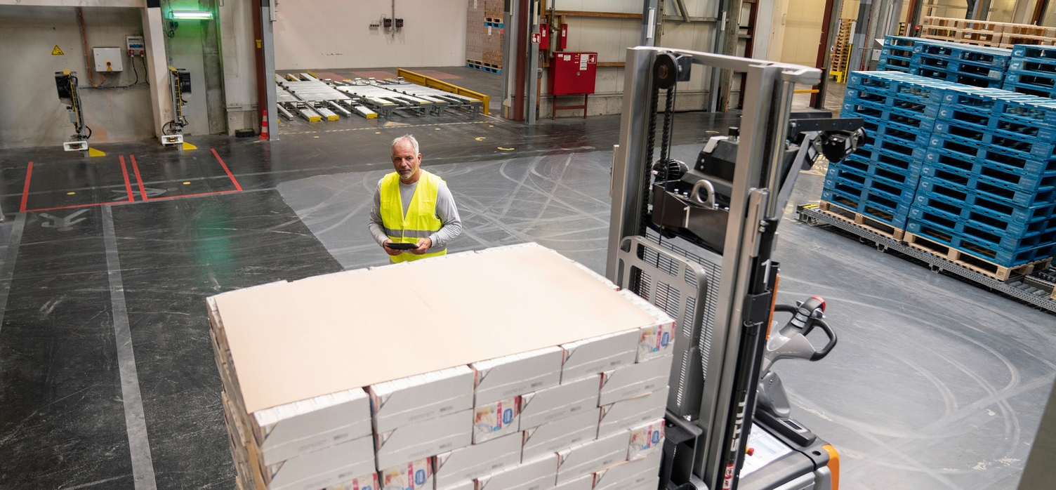 Person standing in a production site