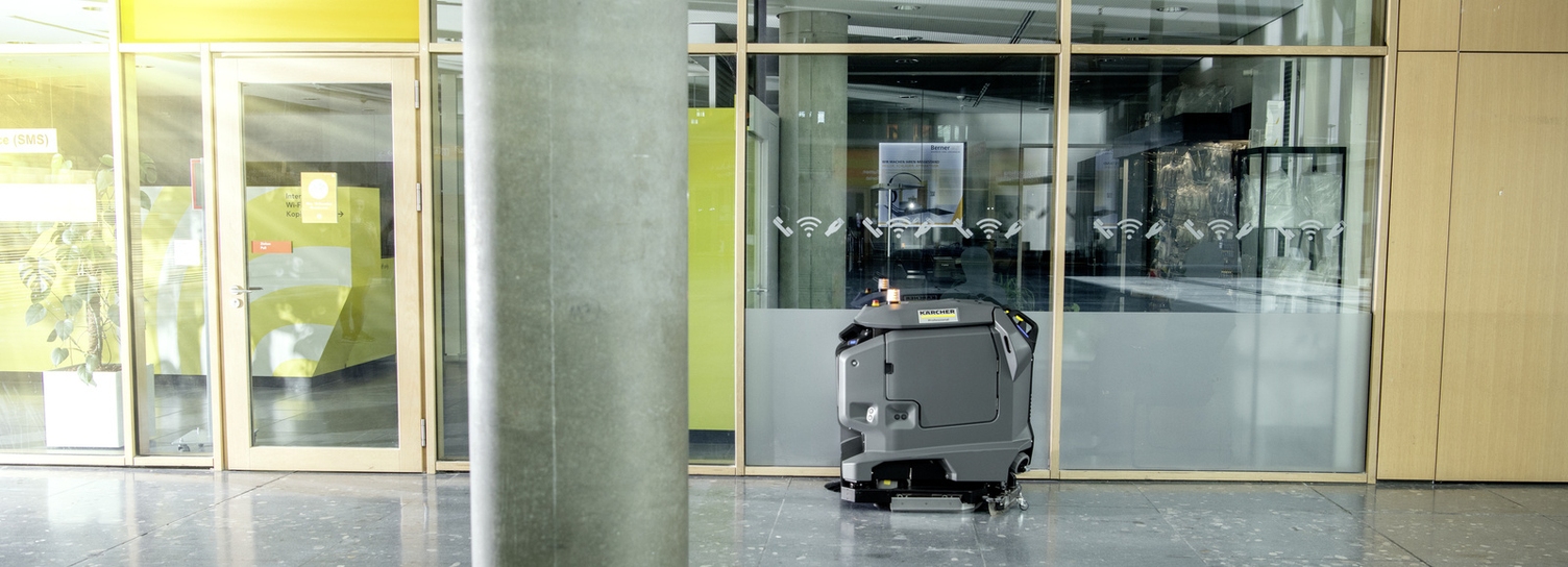 A scrubber dryer robot in use