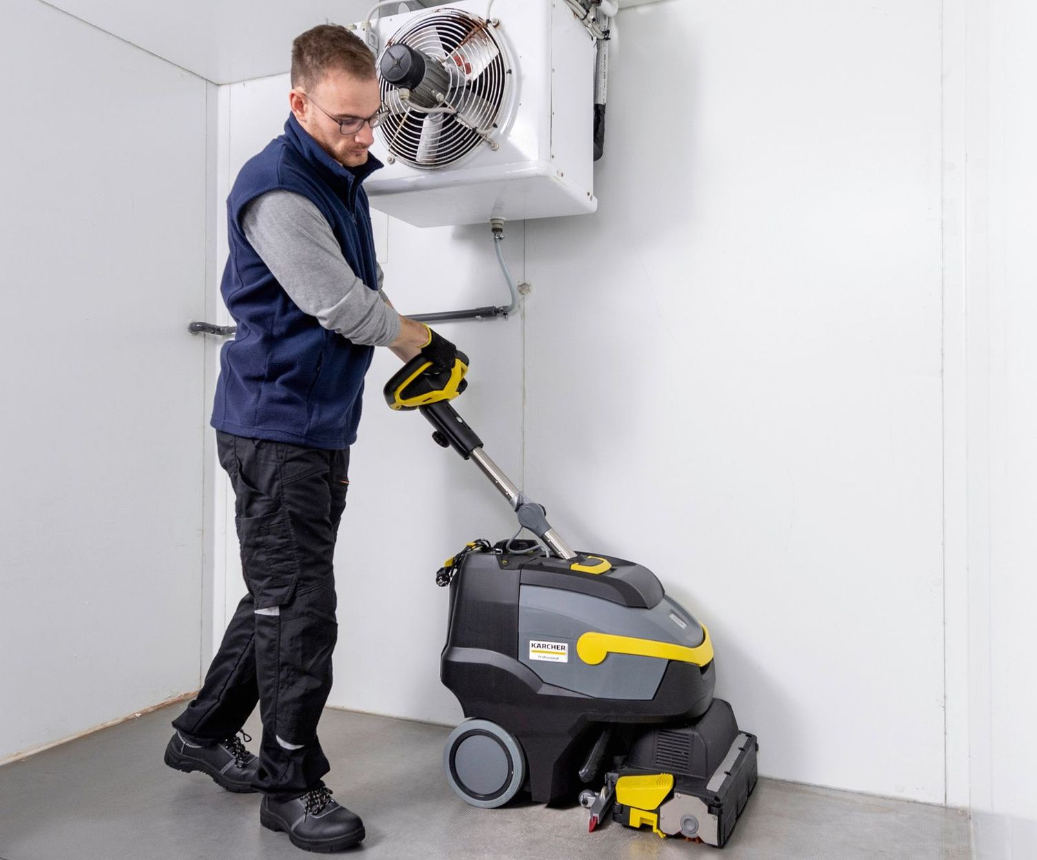 Scrubber dryers in cold storage Man cleaning the floor of a cold store with Kärcher scrubber dryer
