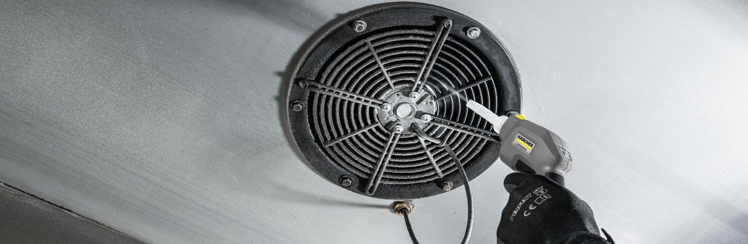 A vent is cleaned with a spray gun. A vent being cleaned with a spray gun.
