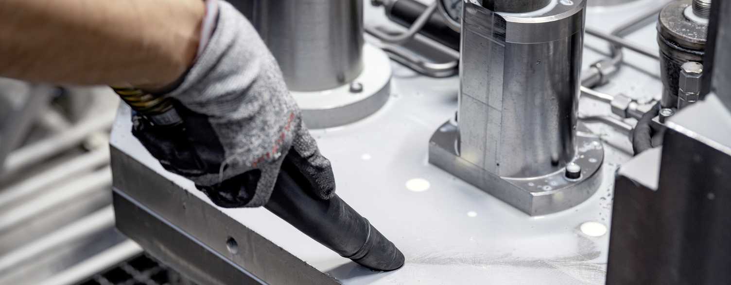 Vacuuming a system with an industrial vacuum cleaner