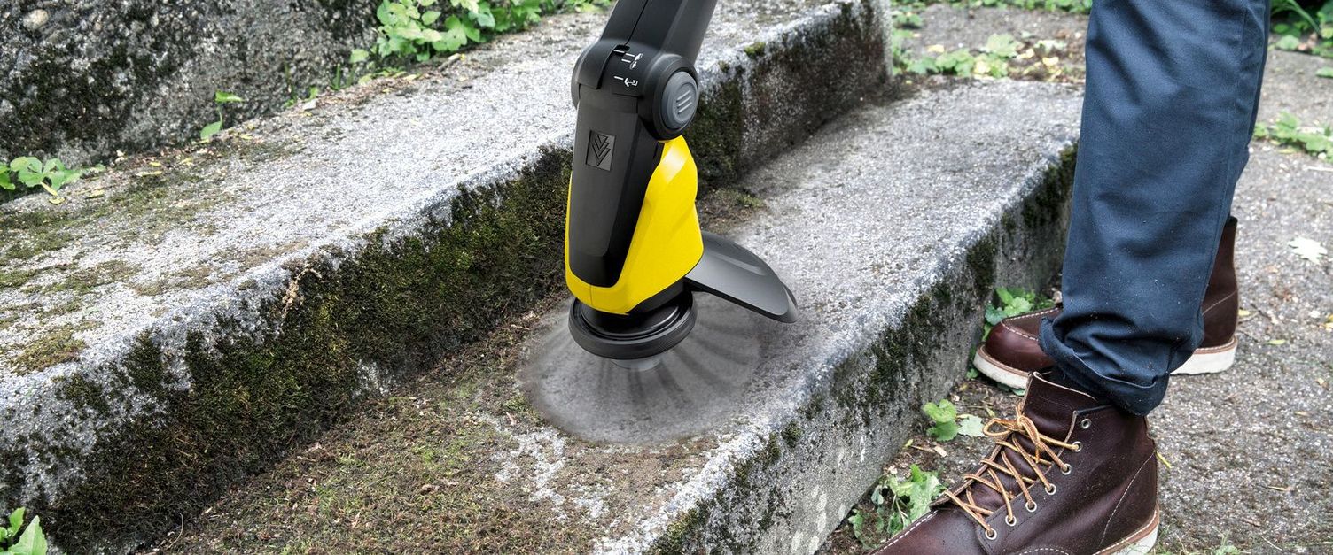 Moss removal on a staircase with a Kärcher weed remover