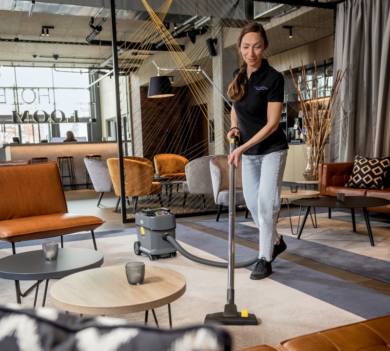 Vaccuming hotel lobby