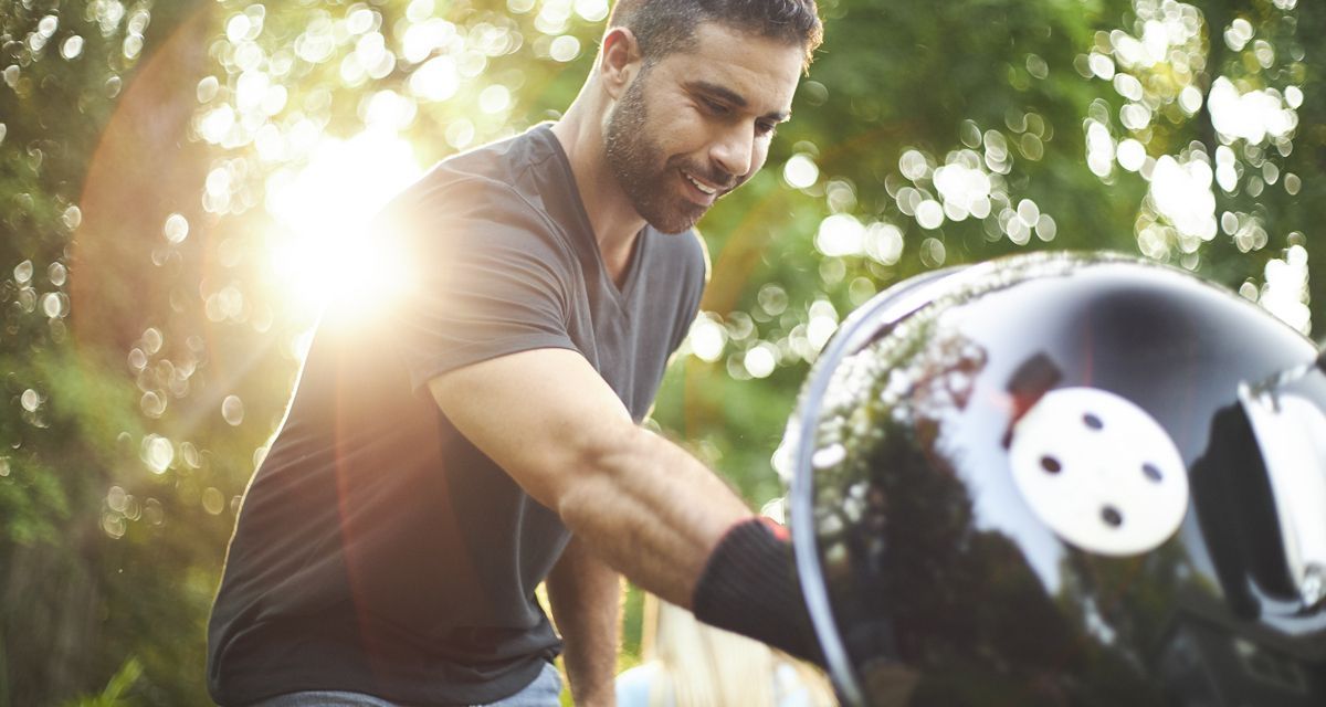 Weber®: Man with a Weber grill