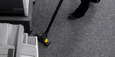 Vacuum cleaning a carpet