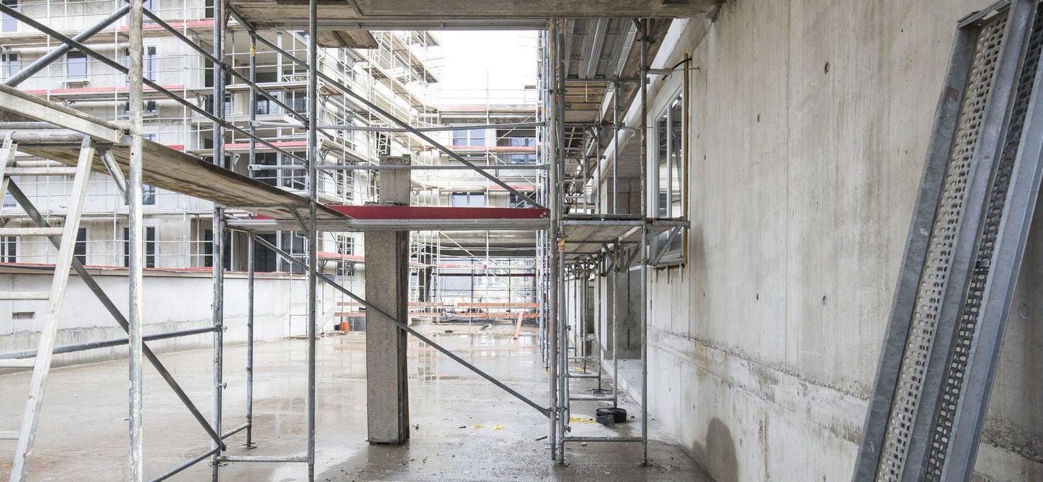 A construction site with scaffolds