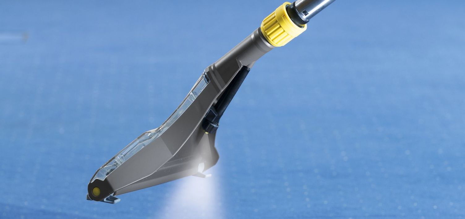 Waterproofing a carpet Detail: A carpet being waterproofed