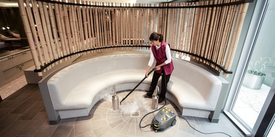 Cleaning a hotel with a steam cleaner Cleaning a hotel with a steam cleaner
