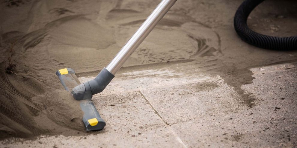 Particle and dirt residues are cleared up during monument cleaning with a wet and dry vacuum cleaner A Kärcher Wet And Dry Vacuum Cleaner clears up dirt particles
