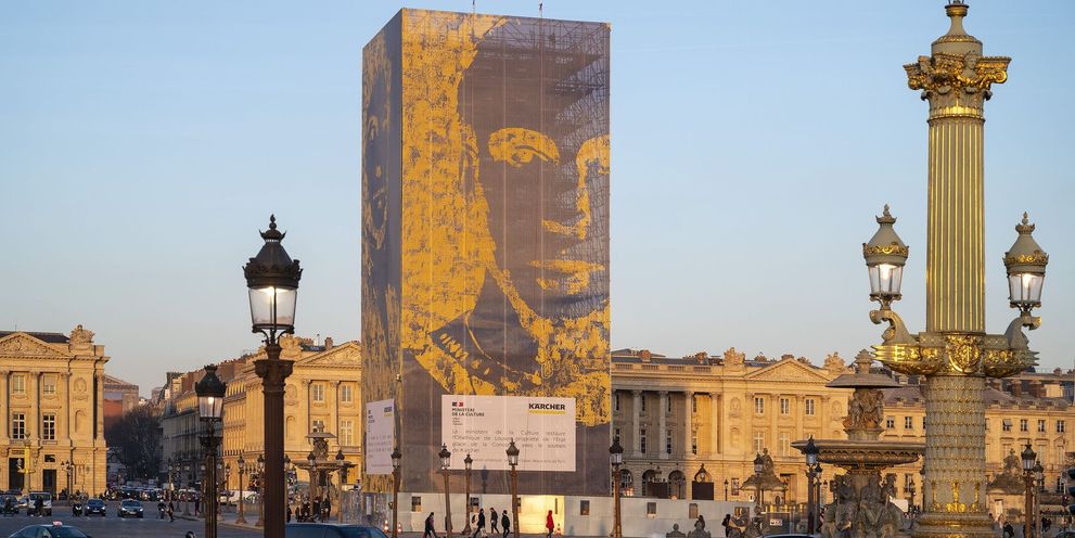 A monument with a scaffold for monument cleaning A monument with a scaffold