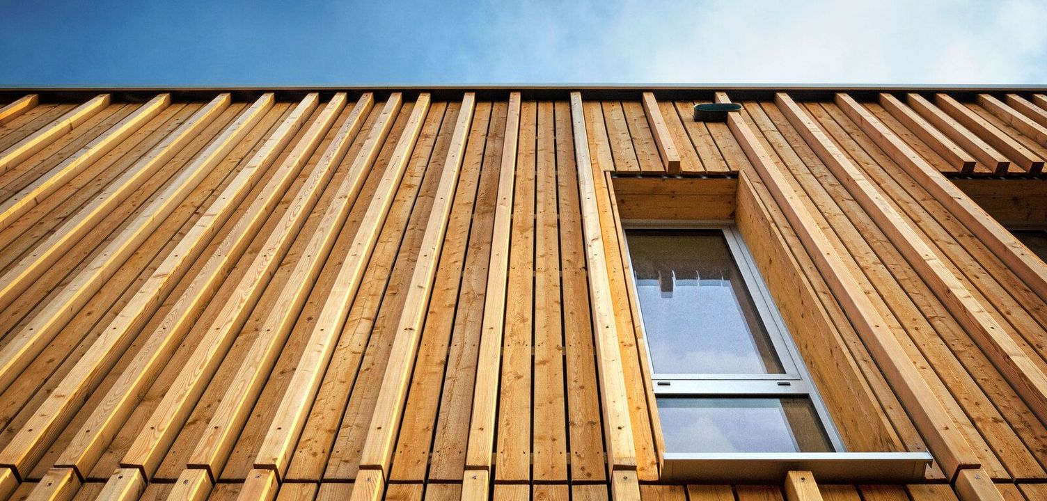 Wooden facade with a window Wooden facade with a window