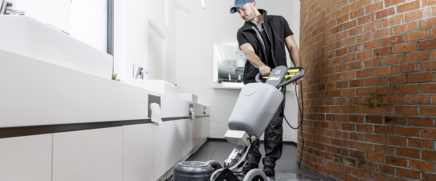 One person operates a single-disc machine.