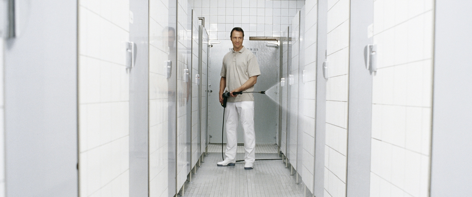 A person uses a scrub-wipe disinfection method.