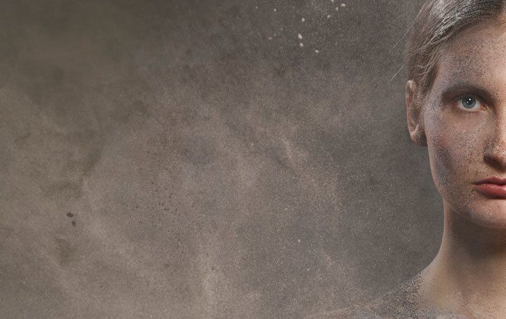 Person breathing construction dust from the air