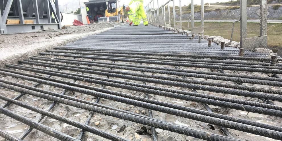 A steel frame after the removal of concrete