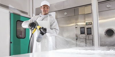 Applying disinfectant with a pressure washer