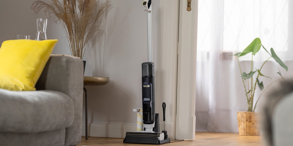 Vacuum mop placed in charging station