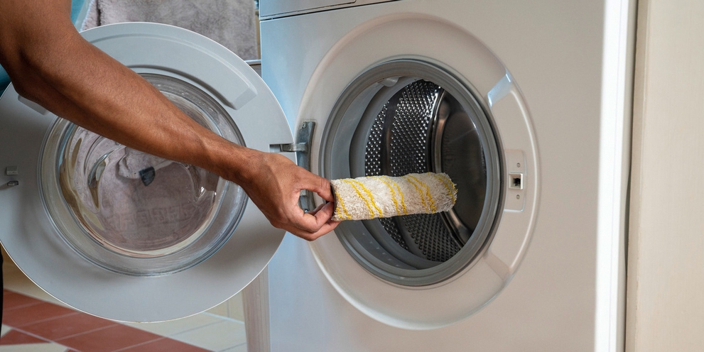 Putting the vacuum mop rollers in the washing machine