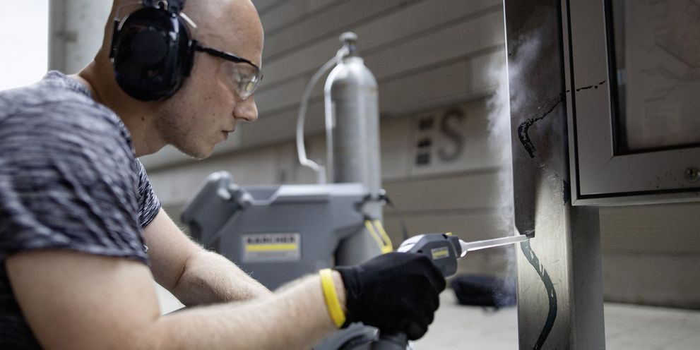 A person dry ice blasting