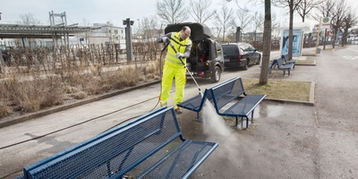 Cleaning benches with a pressure washer