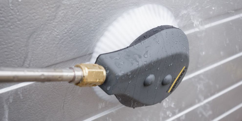 Metal facade cleaning with a brush Metal facade cleaning with a brush