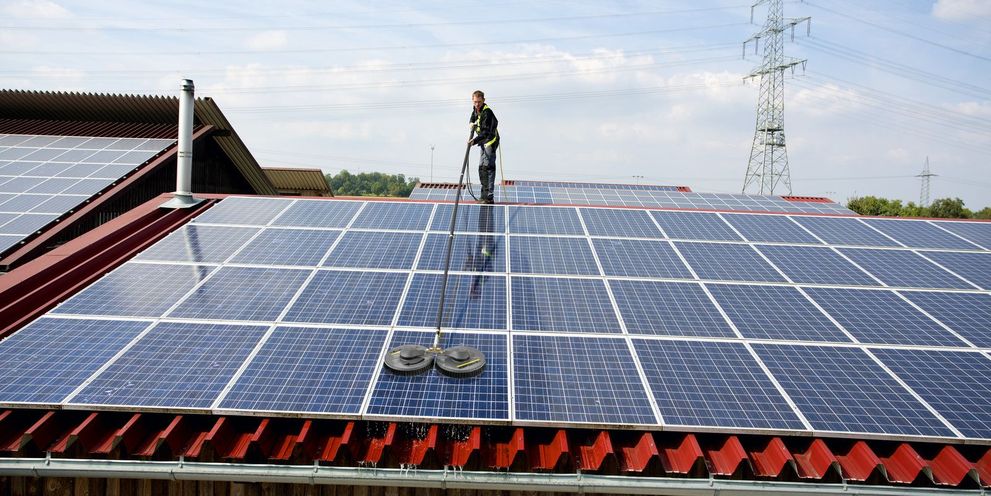 Cleaning solar and photovoltaic panels