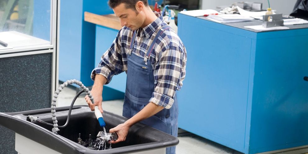 Car workshop parts cleaning