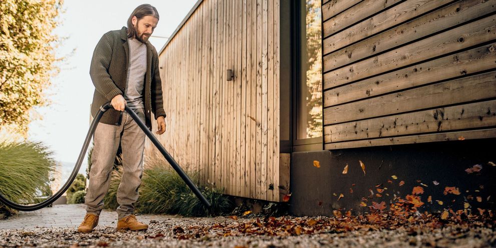 Wet and dry vacuum cleaners with blower function