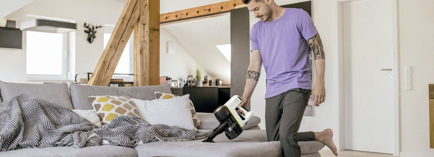 Vacuuming upholstery with a Kärcher vacuum cleaner