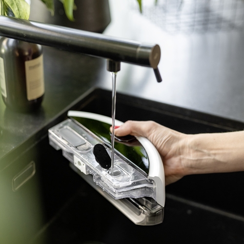 Filling the fresh water tank with tap water
