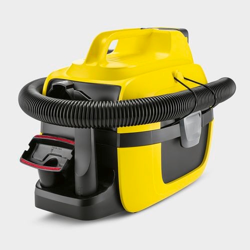 Hose wrapped around wet and dry cleaner and accessories stored directly at the product