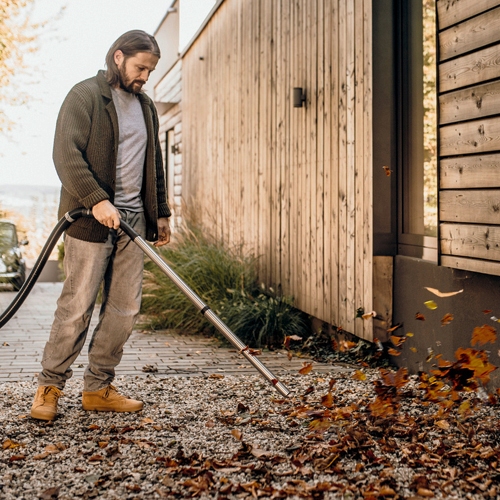 Blowing away leaves with wet and dry vacuum cleaner blower function