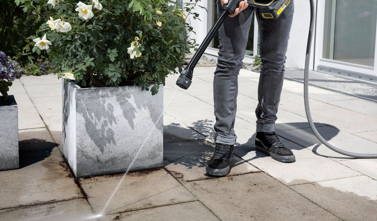 Cleaning patio stone slabs with a Kärcher pressure washer