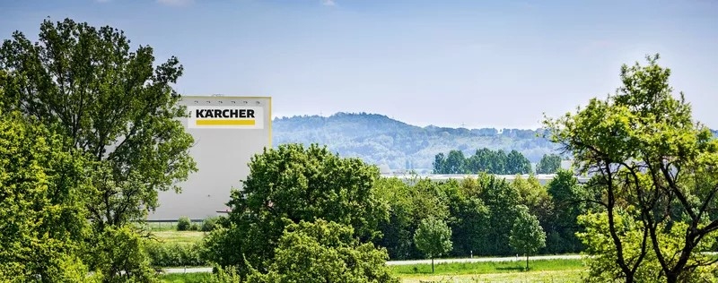 Karcher building behind trees