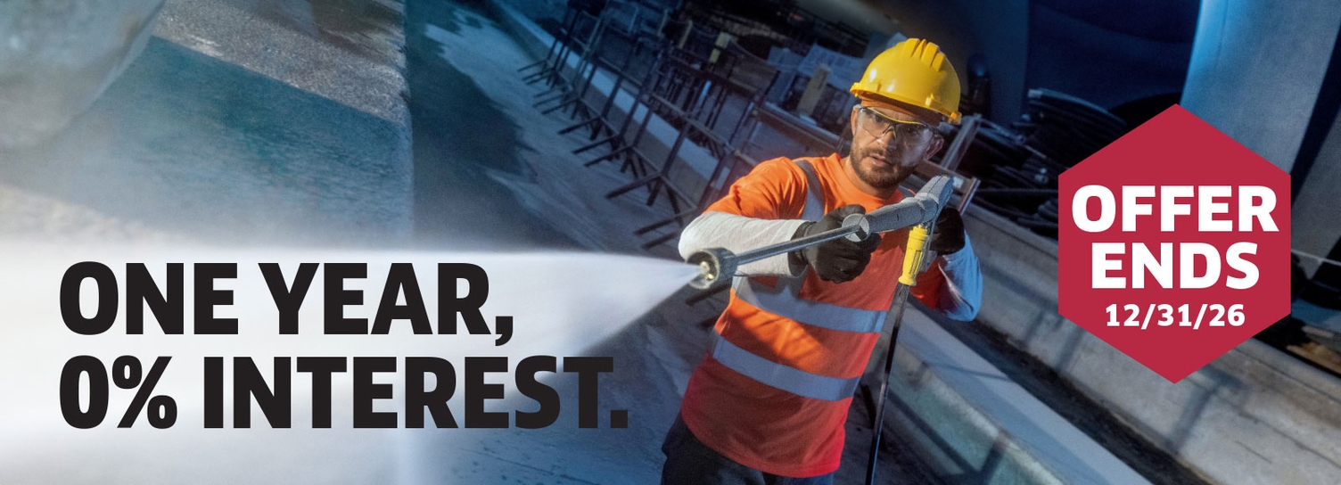 Kärcher Special Offer: One Year / Zero Interest A worker in a hard hat cleans with a Kärcher commercial pressure washer.