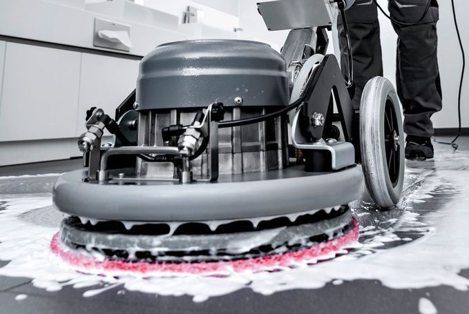 Kärcher floor scrubber works up a lather on a linoleum floor