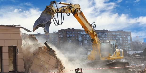 Building being demolished, waiting to be cleaned by Karcher pressure washers.