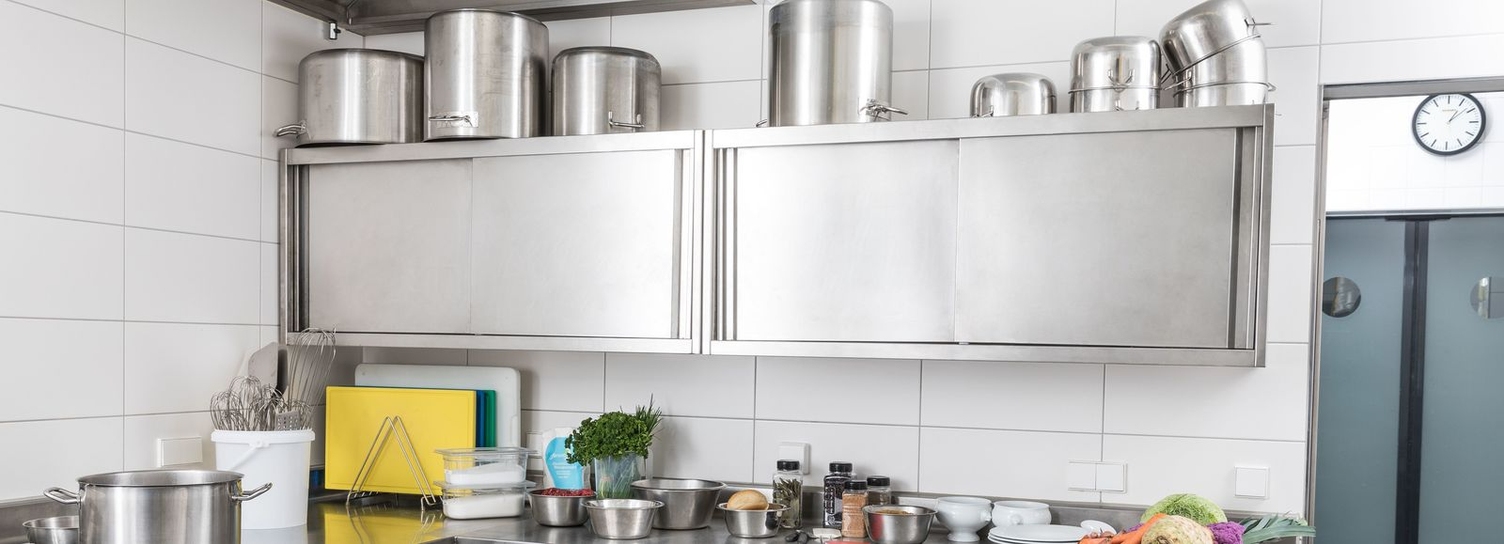 Cleaning in the commercial kitchen Ingredients on the counter of a clean commercial kitchen