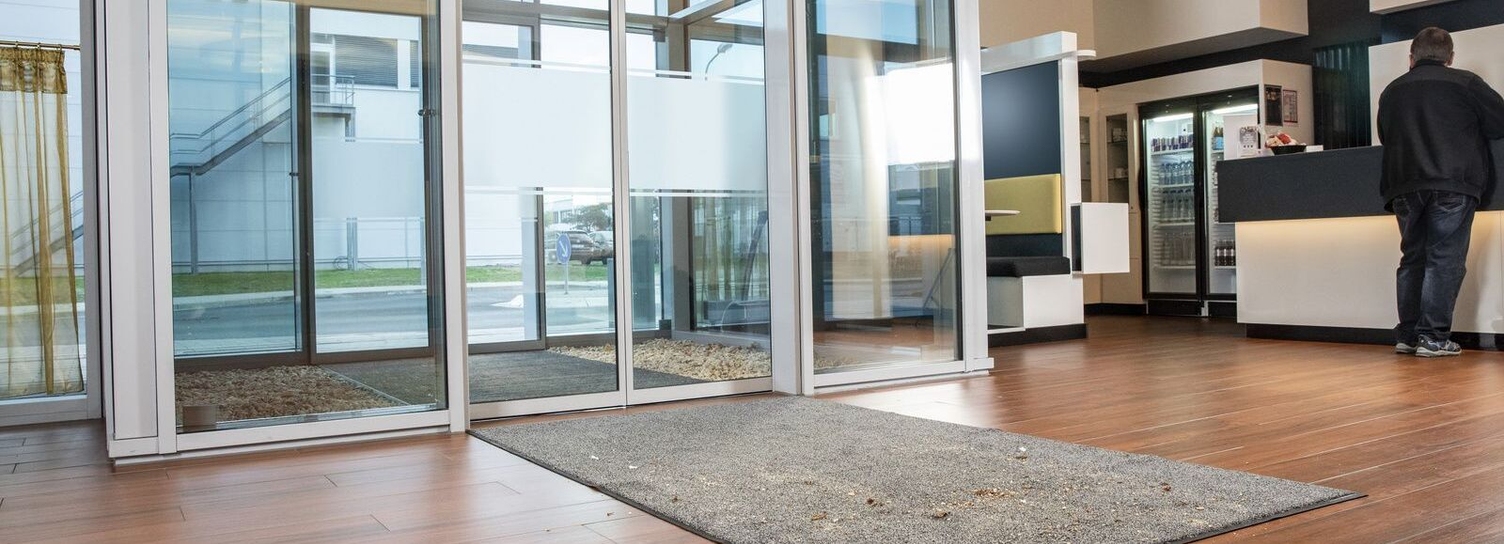 An entrance area with sealed wooden floor