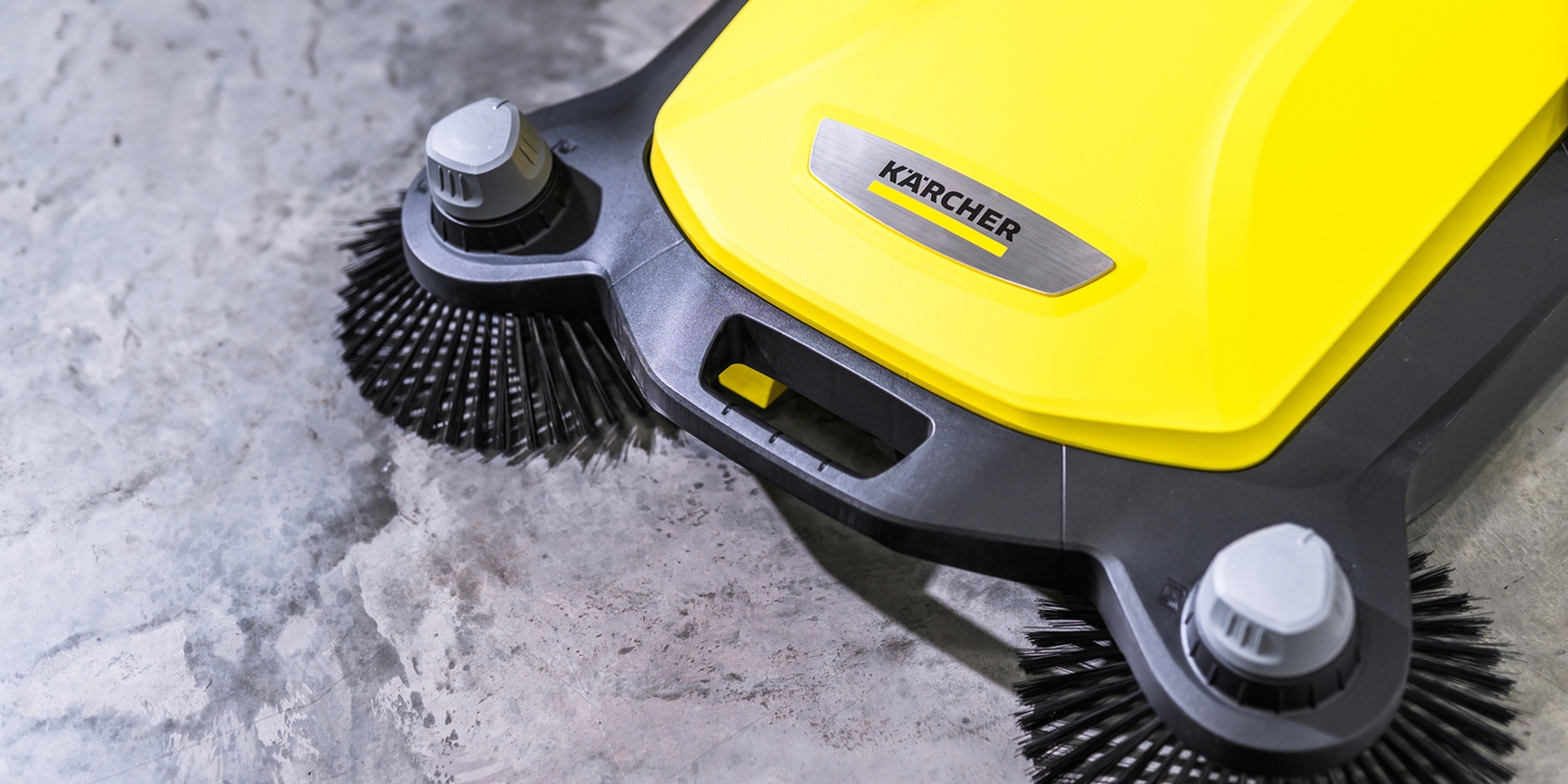 Karcher Push Sweeper Cleans Concrete Shop Floor