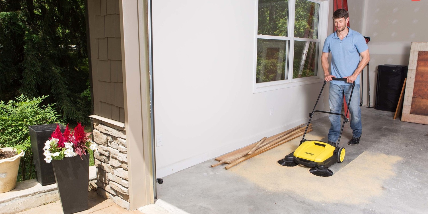 Karcher S650 Push Sweeper Cleans Sawdust From Garage