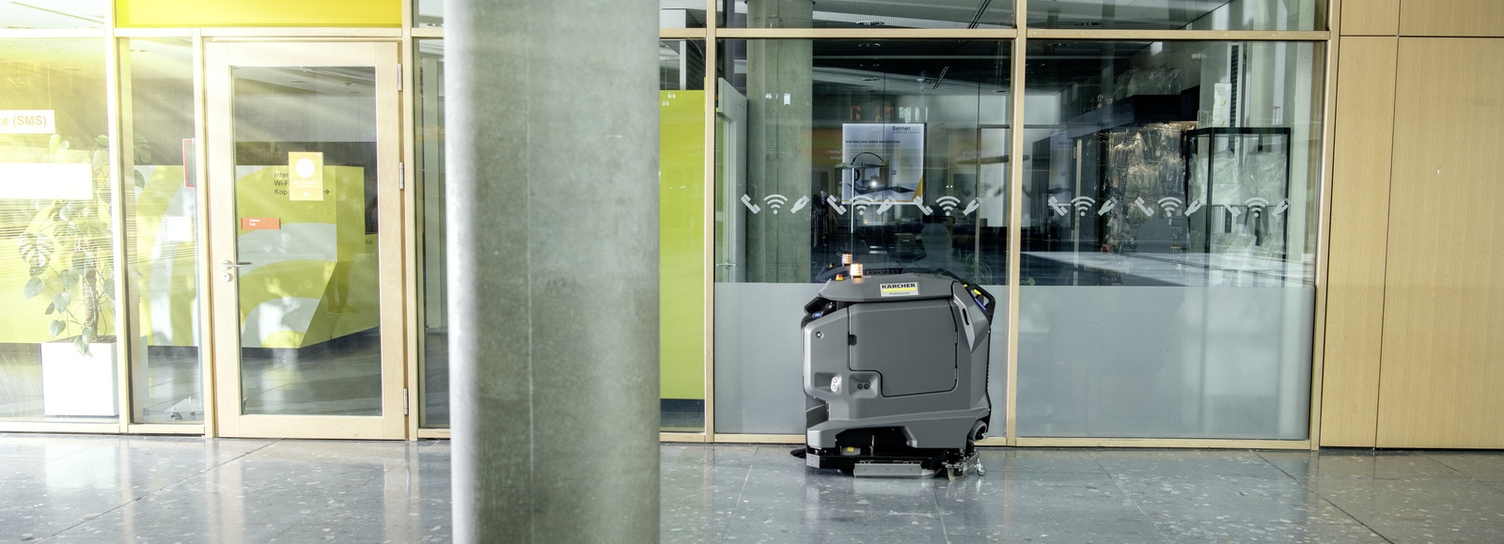 Prerequisite No. 3: Checking the Quality of the Cleaning Result A KIRA autonomous floor scrubber cleans a hallway on its own.
