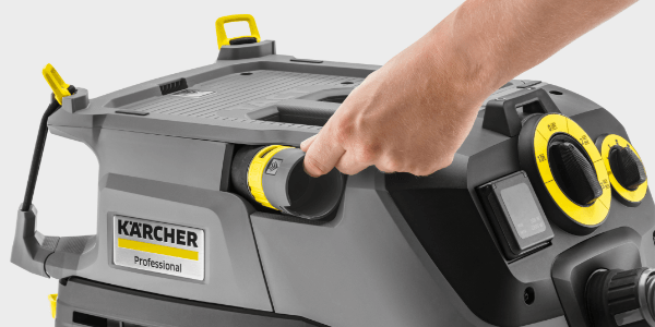 Yellow touch points on Kärcher products indicate various levers and functional parts of the machine.