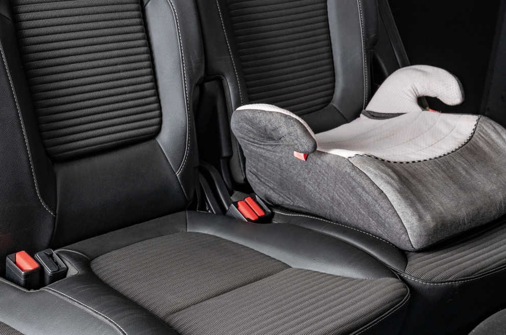 Vehicle Interiors: After A dirty child seat after dry ice cleaning.
