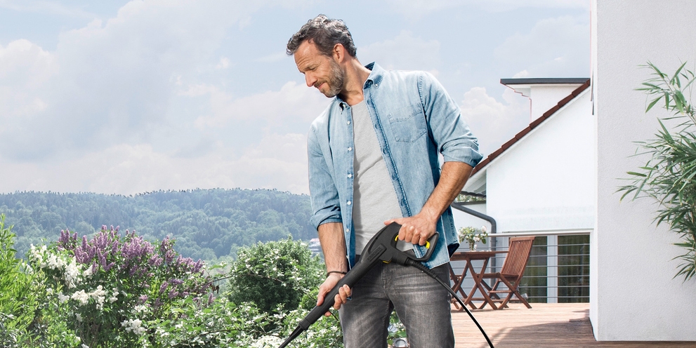 Karcher Electric Pressure Washer Spray Gun Cleans Stone