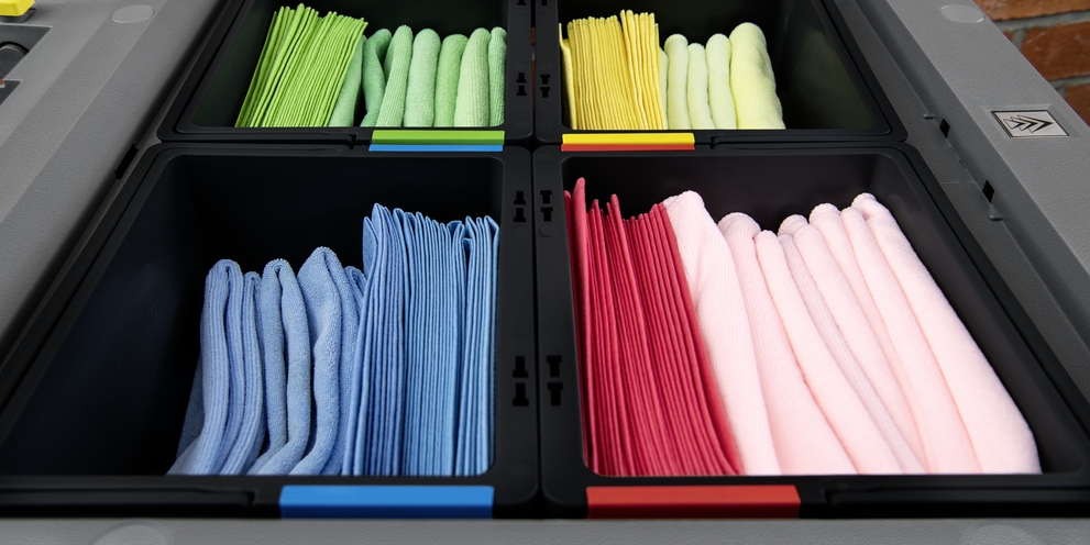 Color-Coding Cleaning Cloths A drawer full of color-coded cleaning textiles for specific application areas.