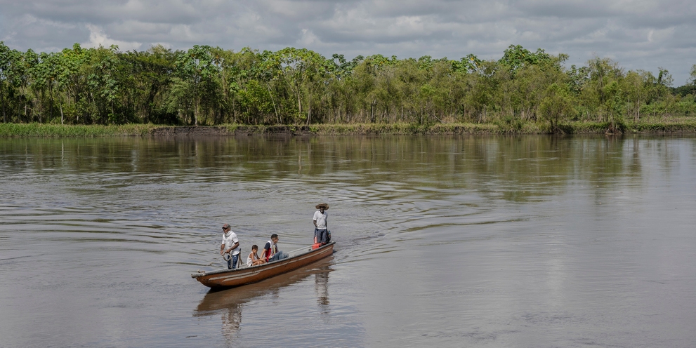 Photo shows simple fishing boat on the Magdalen River. Since the green filter system has existed, only treated wastewater has been channeled into the Río Magdalena - the region's lifeline.